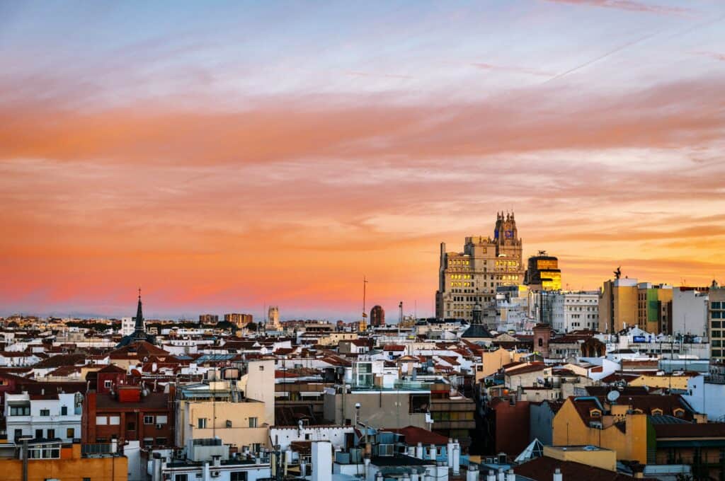 Aerial view of Madrid's skyline at dusk, with the Telefonica Building to be recognised in the background.