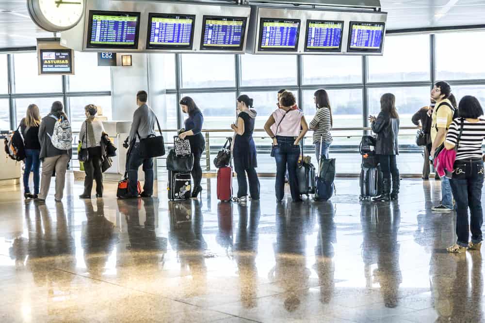 passengers wait for Departure in Madrid Airport 