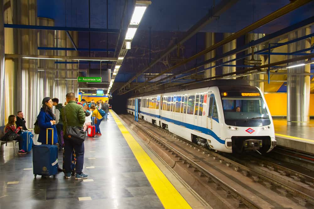 Metro train arrives at Madrid metro platform